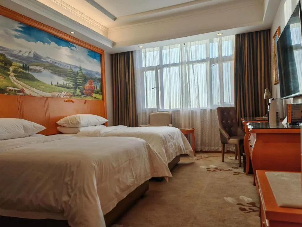 Bed in Vienna Hotel Qinghai Dachaidan