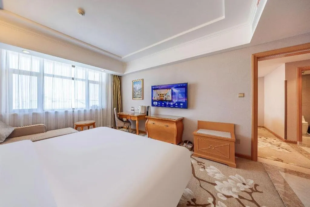 Bed in Vienna Hotel Qinghai Dachaidan