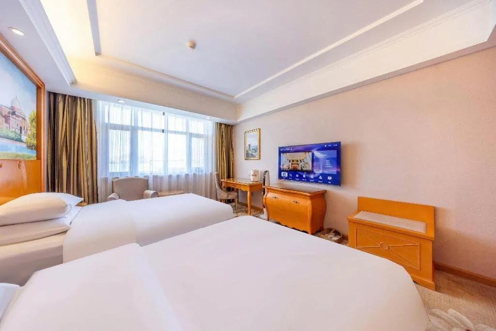 Bed in Vienna Hotel Qinghai Dachaidan