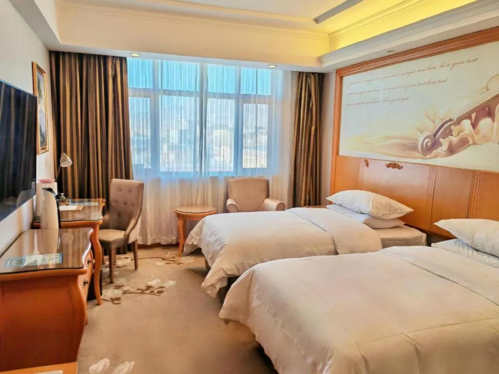 Bed in Vienna Hotel Qinghai Dachaidan