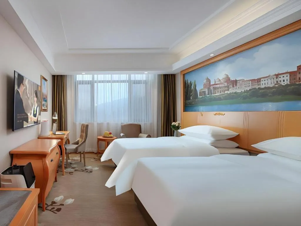 Bed in Vienna Hotel Qinghai Dachaidan