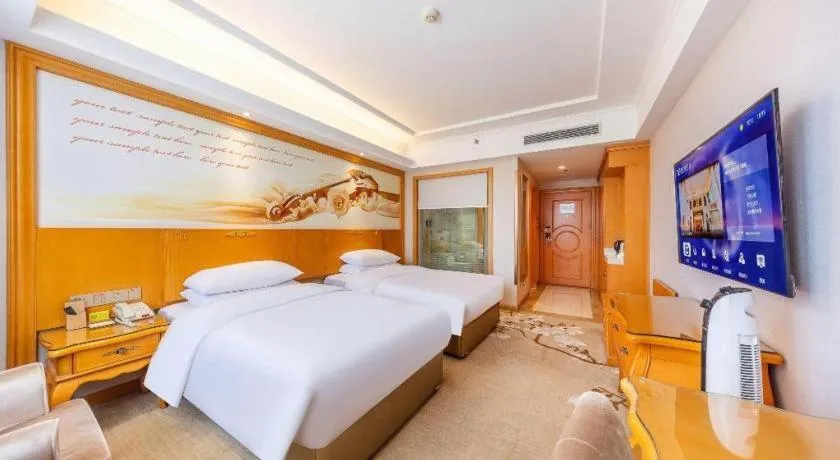 Bed in Vienna Hotel Qinghai Dachaidan