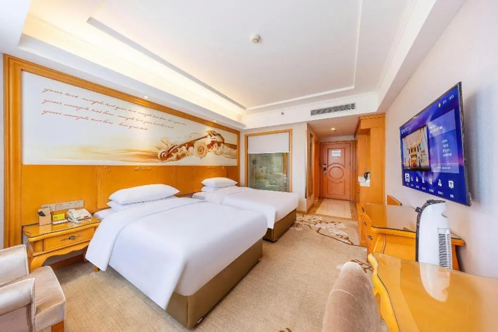 Bed in Vienna Hotel Qinghai Dachaidan