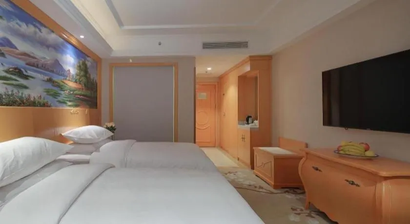 Bed in Vienna Hotel Qinghai Dachaidan