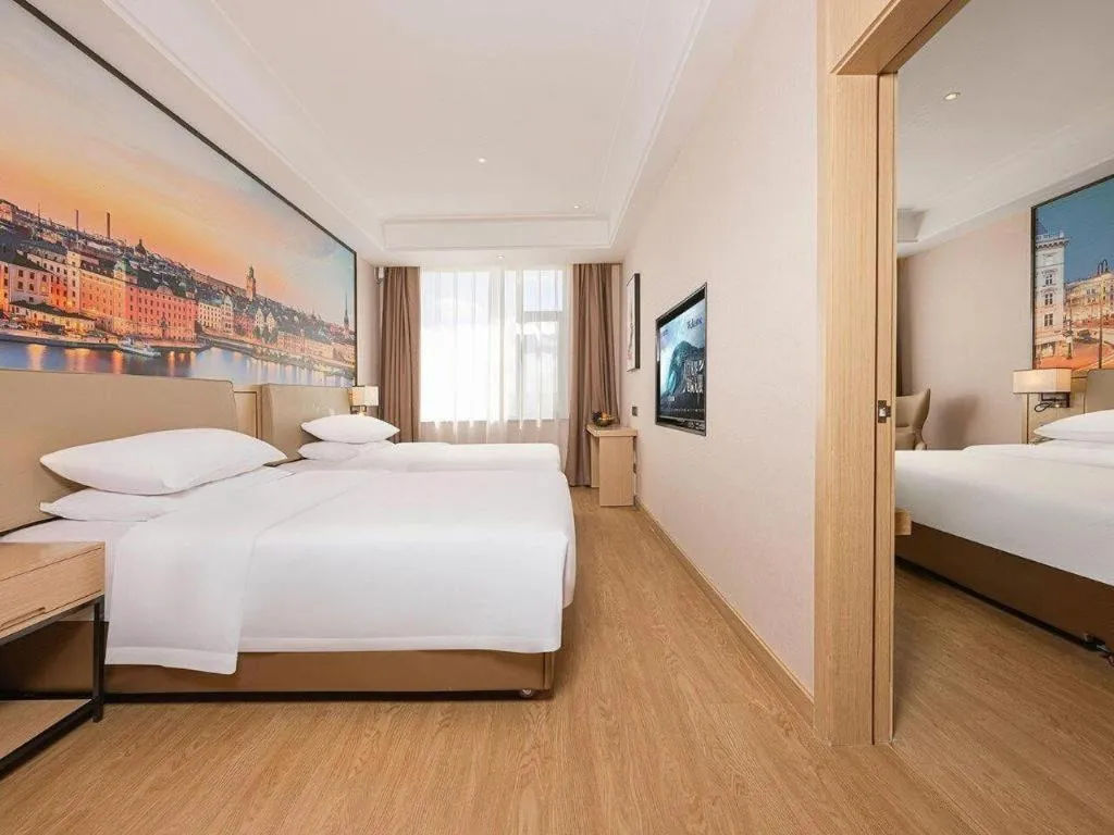 Bed in Vienna Hotel Qinghai Dachaidan