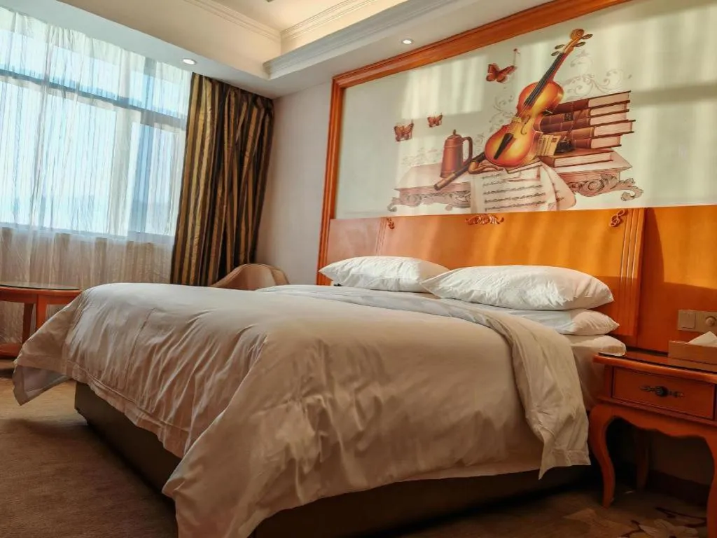 Bed in Vienna Hotel Qinghai Dachaidan