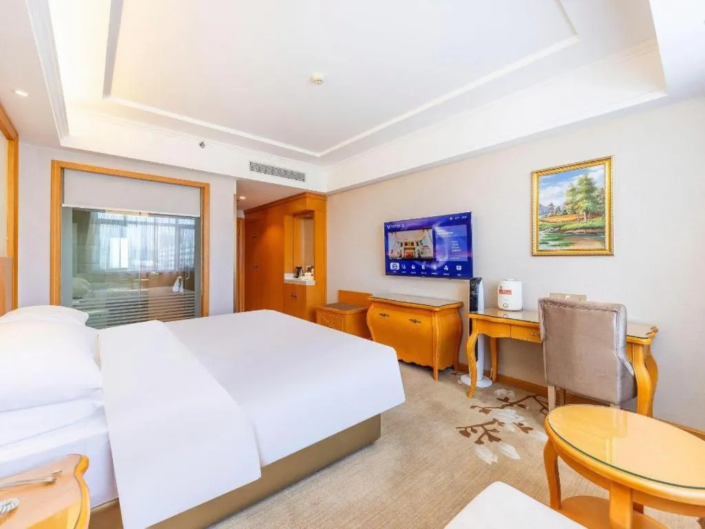 Bed in Vienna Hotel Qinghai Dachaidan