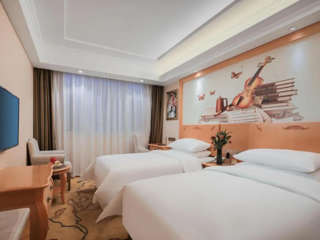 Bed in Vienna Hotel Hebei Cangzhou Mingzhu Market