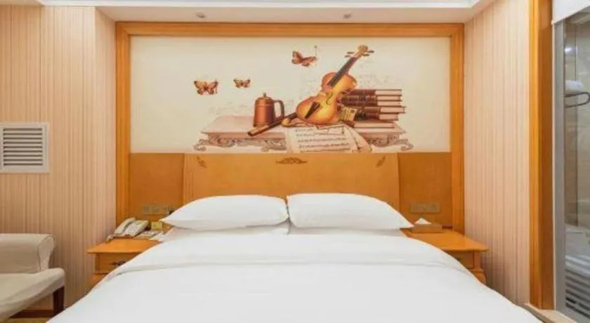 Bed in Vienna Hotel Hebei Cangzhou Mingzhu Market