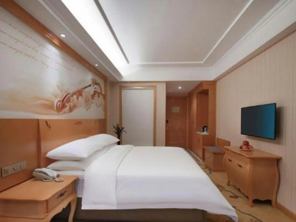 Bed in Vienna Hotel Hebei Cangzhou Mingzhu Market