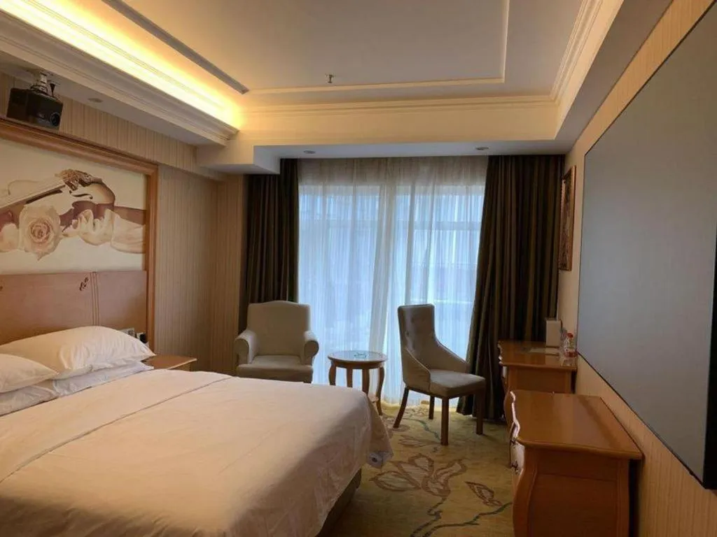 Bed in Vienna Hotel Hebei Cangzhou Mingzhu Market