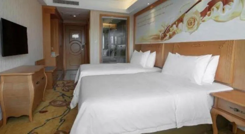 Bed in Vienna Hotel Hebei Cangzhou Mingzhu Market