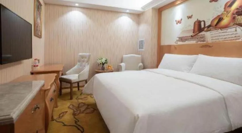 Bed in Vienna Hotel Hebei Cangzhou Mingzhu Market