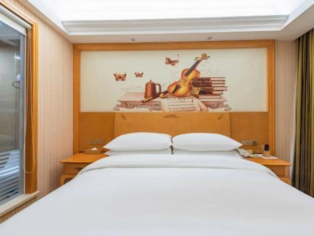 Bed in Vienna Hotel Hebei Cangzhou Mingzhu Market