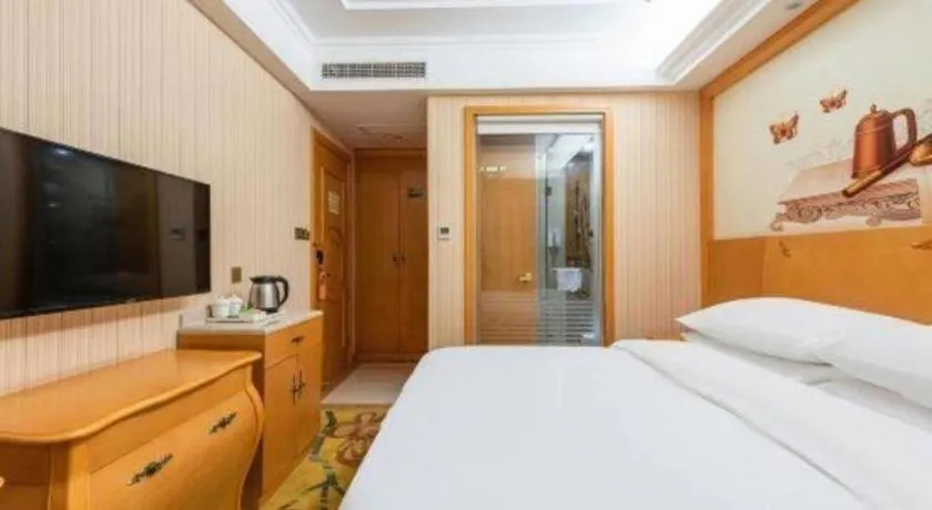 Bed in Vienna Hotel Hebei Cangzhou Mingzhu Market