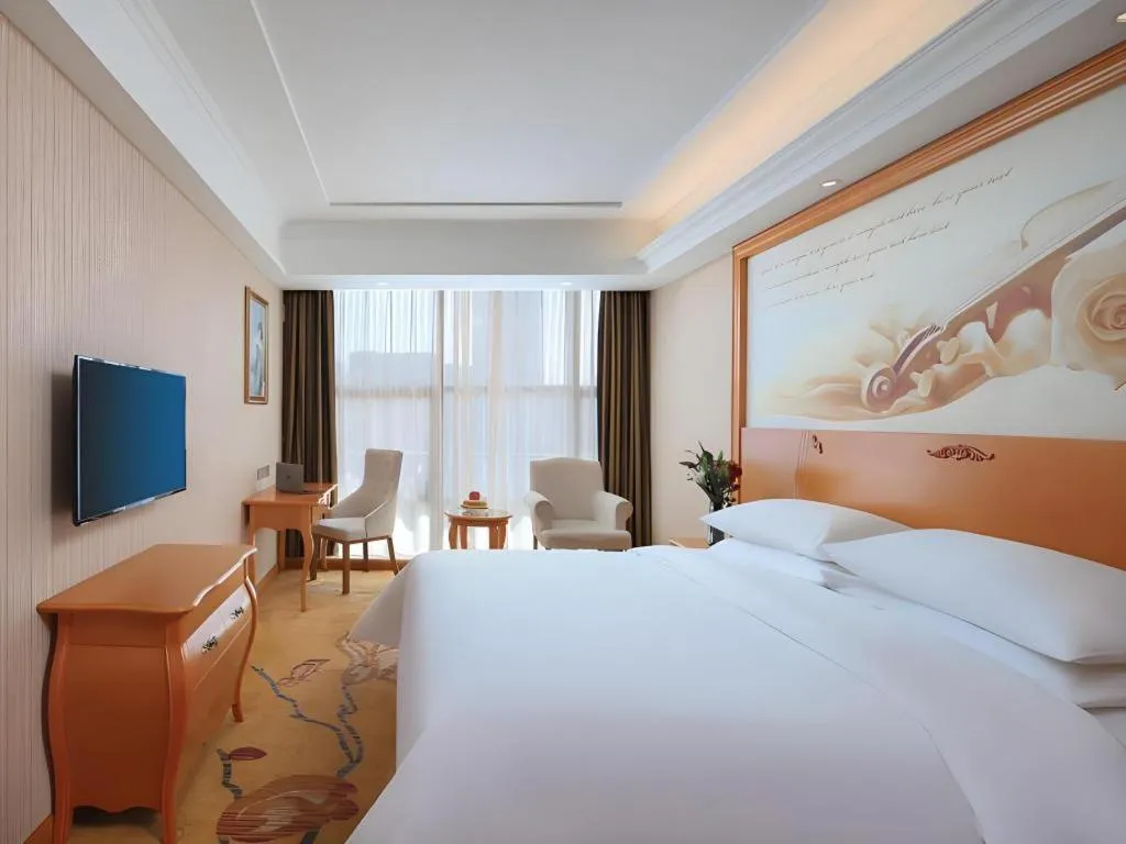 Bed in Vienna Hotel Hebei Cangzhou Mingzhu Market