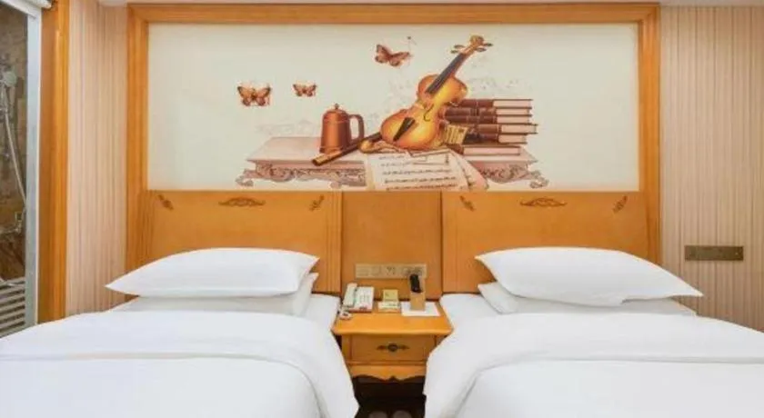 Bed in Vienna Hotel Hebei Cangzhou Mingzhu Market