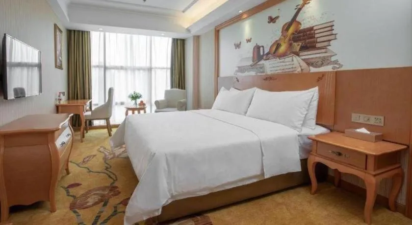 Bed in Vienna Hotel Hebei Cangzhou Mingzhu Market