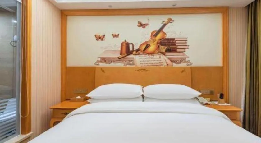 Bed in Vienna Hotel Hebei Cangzhou Mingzhu Market