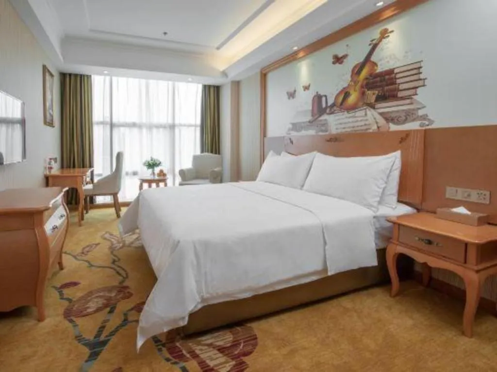 Bed in Vienna Hotel Hebei Cangzhou Mingzhu Market