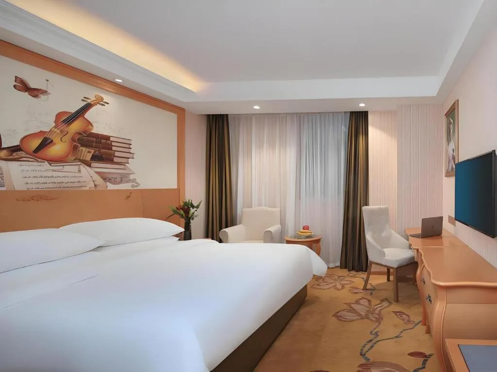 Bed in Vienna Hotel Hebei Cangzhou Mingzhu Market