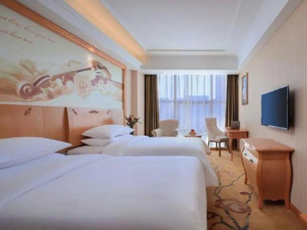 Bed in Vienna Hotel Hebei Cangzhou Mingzhu Market