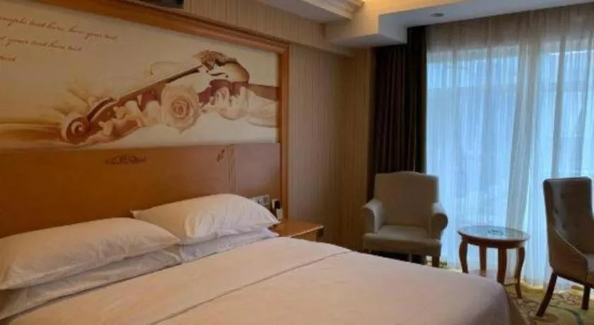 Bed in Vienna Hotel Hebei Cangzhou Mingzhu Market