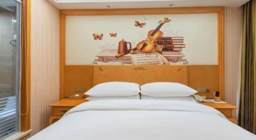 Bed in Vienna Hotel Hebei Cangzhou Mingzhu Market