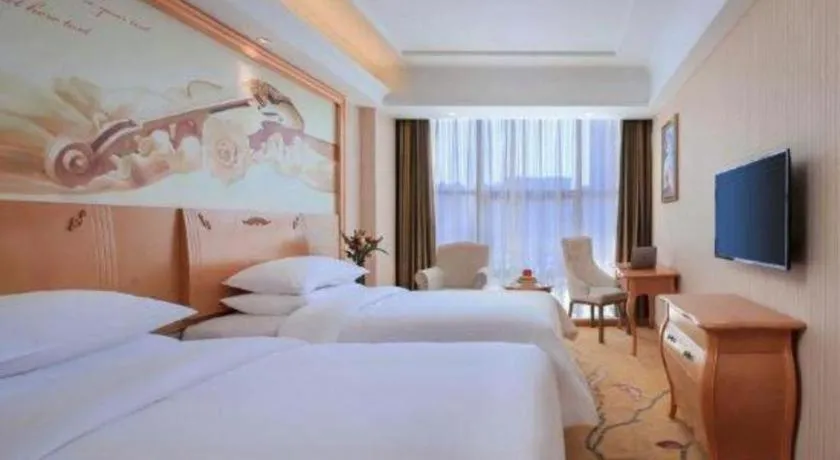 Bed in Vienna Hotel Hebei Cangzhou Mingzhu Market