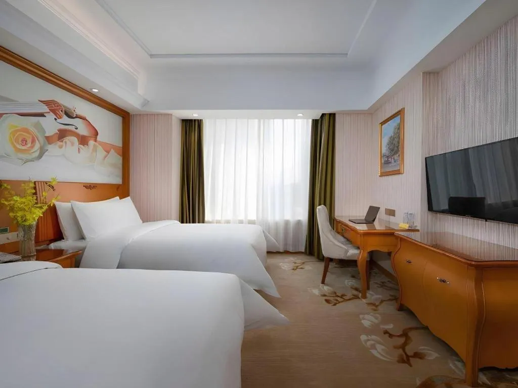 Bed in Vienna Hotel Hebei Hengshui High-Speed Railway Station