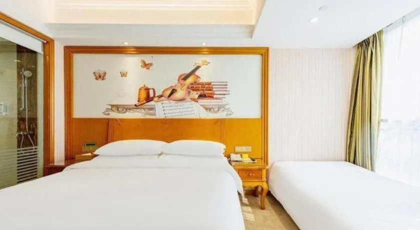 Bed in Vienna Hotel Hebei Hengshui High-Speed Railway Station