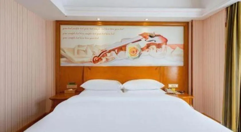 Bed in Vienna Hotel Hebei Hengshui High-Speed Railway Station