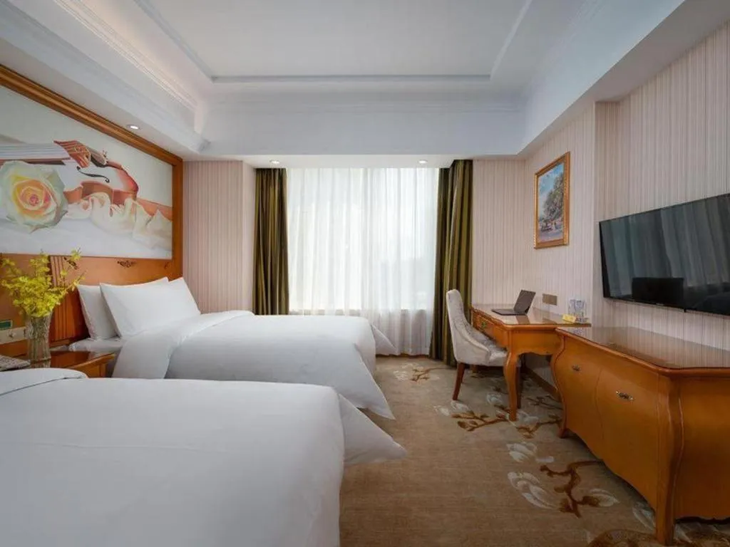 Bed in Vienna Hotel Hebei Hengshui High-Speed Railway Station