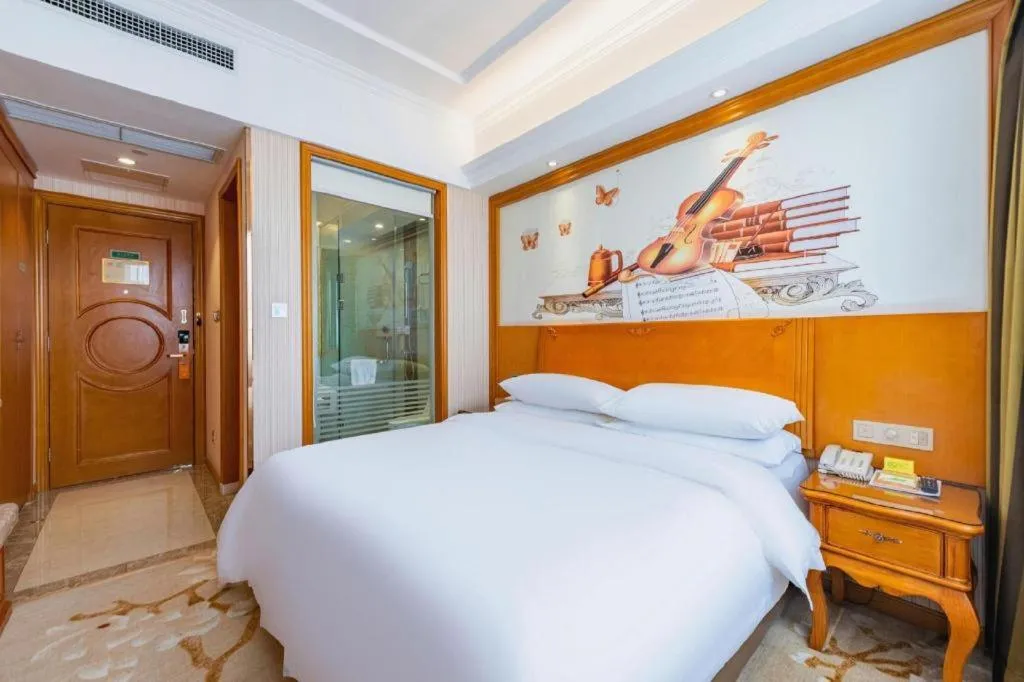 Bed in Vienna Hotel Hebei Hengshui High-Speed Railway Station