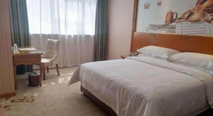 Bed in Vienna Hotel Hebei Hengshui High-Speed Railway Station