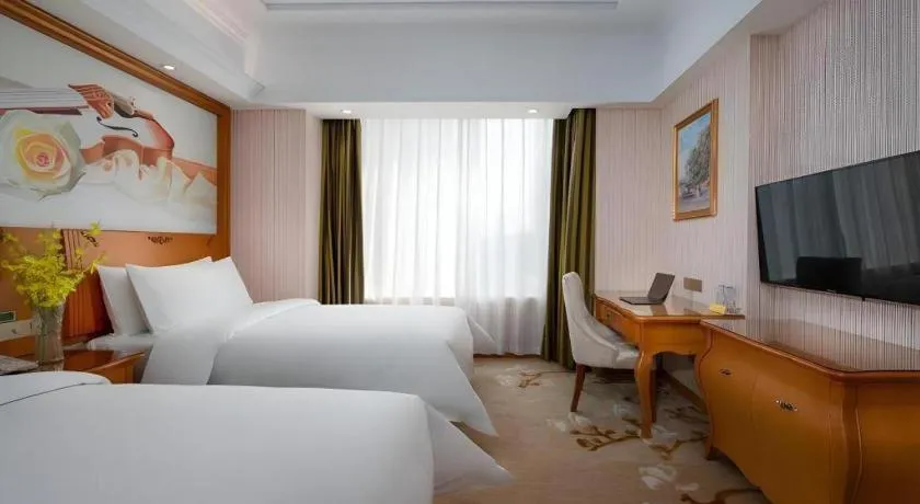 Bed in Vienna Hotel Hebei Hengshui High-Speed Railway Station