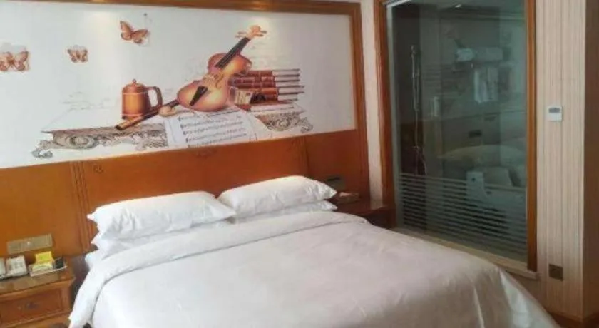 Bed in Vienna Hotel Hebei Hengshui High-Speed Railway Station