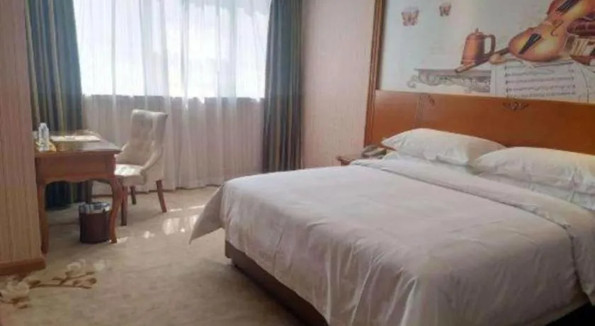 Bed in Vienna Hotel Hebei Hengshui High-Speed Railway Station