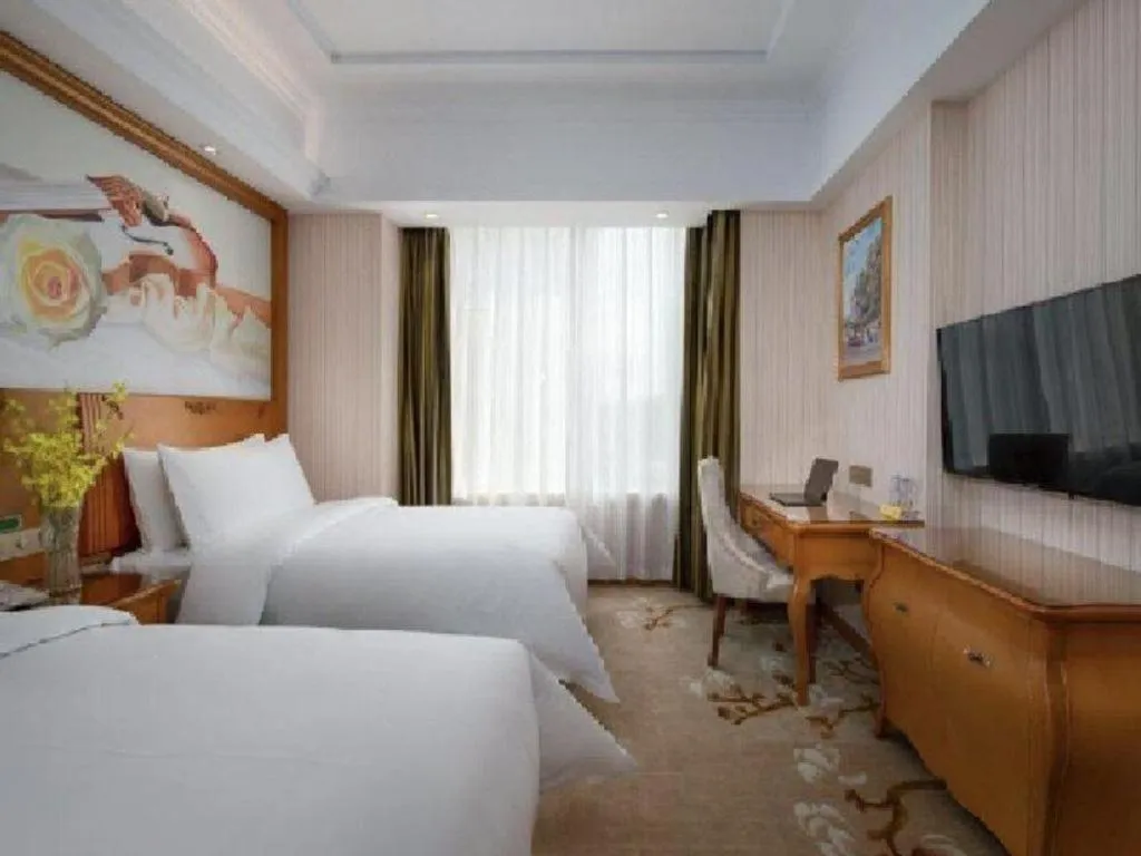 Bed in Vienna Hotel Hebei Hengshui High-Speed Railway Station