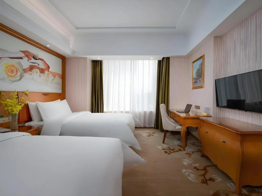 Bed in Vienna Hotel Hebei Hengshui High-Speed Railway Station