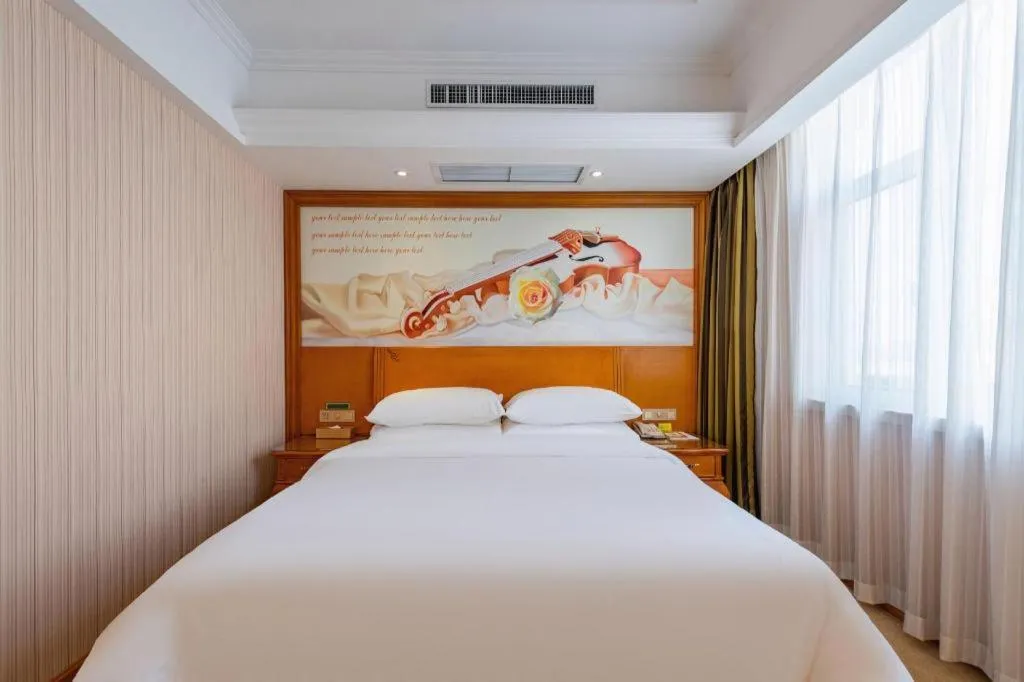 Bed in Vienna Hotel Hebei Hengshui High-Speed Railway Station