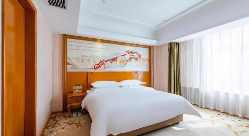 Bed in Vienna Hotel Hebei Hengshui High-Speed Railway Station
