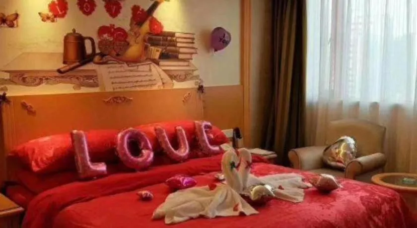 Bed in Vienna Hotel Hunan Jishou Fenghuang Ancient City