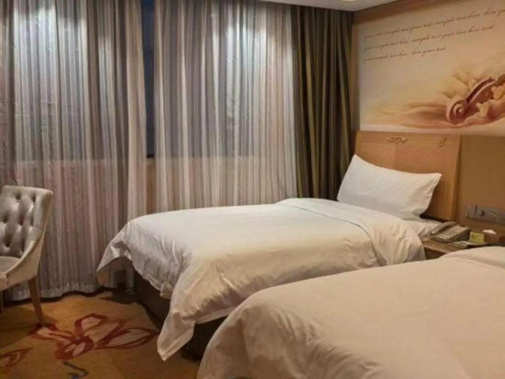 Bed in Vienna Hotel Hunan Jishou Fenghuang Ancient City