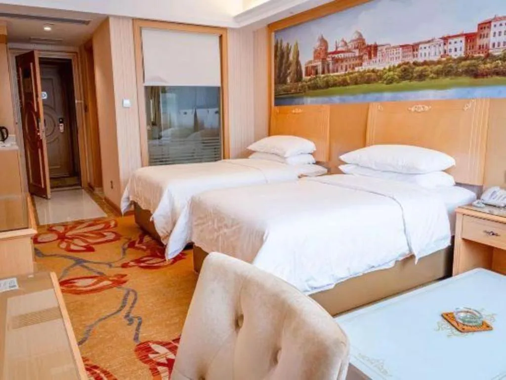 Bed in Vienna Hotel Hunan Jishou Fenghuang Ancient City