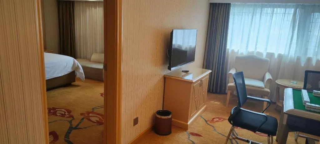 Bed in Vienna Hotel Hunan Jishou Fenghuang Ancient City