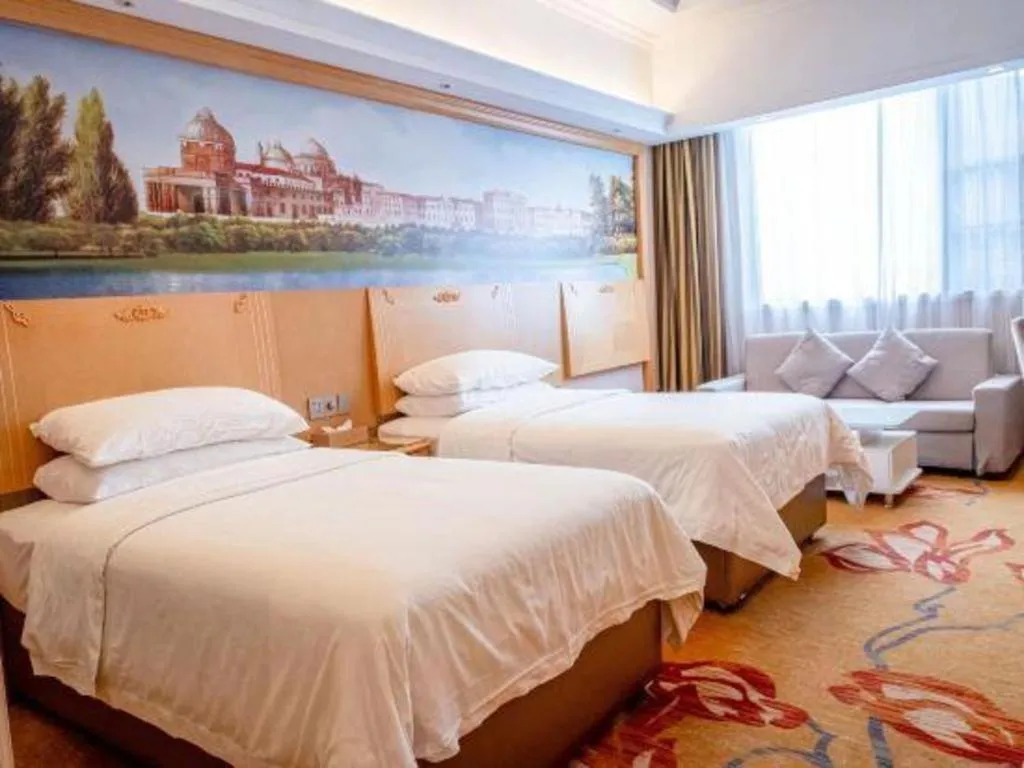 Bed in Vienna Hotel Hunan Jishou Fenghuang Ancient City