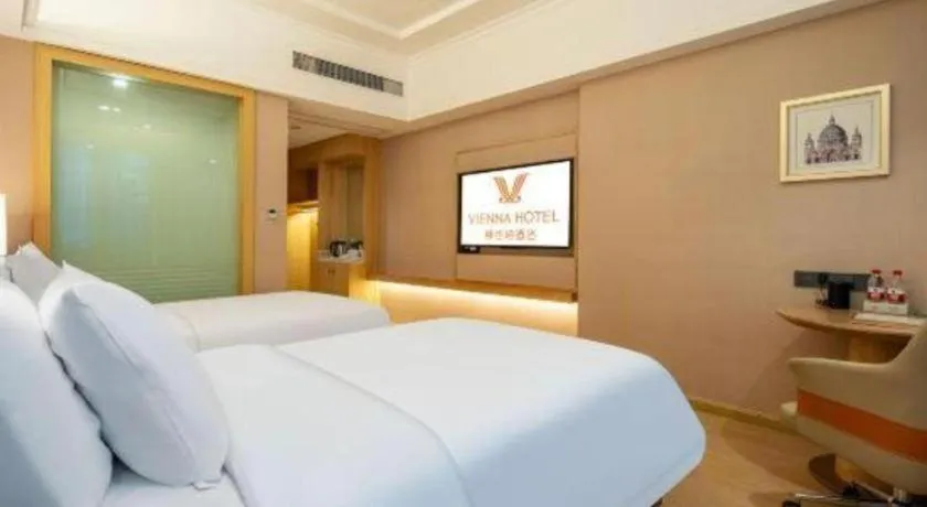 Bed in Vienna Hotel Hunan Jishou Fenghuang Ancient City