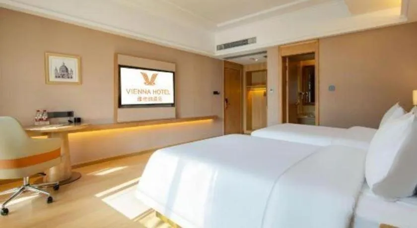 Bed in Vienna Hotel Hunan Jishou Fenghuang Ancient City