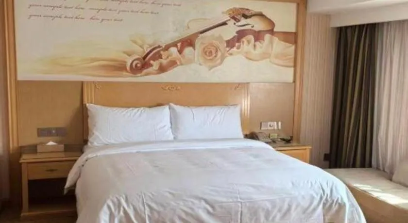 Bed in Vienna Hotel Hunan Jishou Fenghuang Ancient City